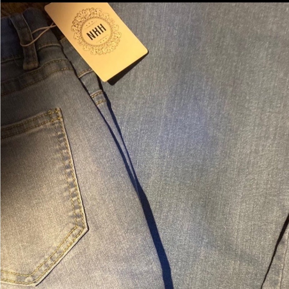 Jeans Flare and Frayed button fly